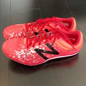 pink new balance spikes